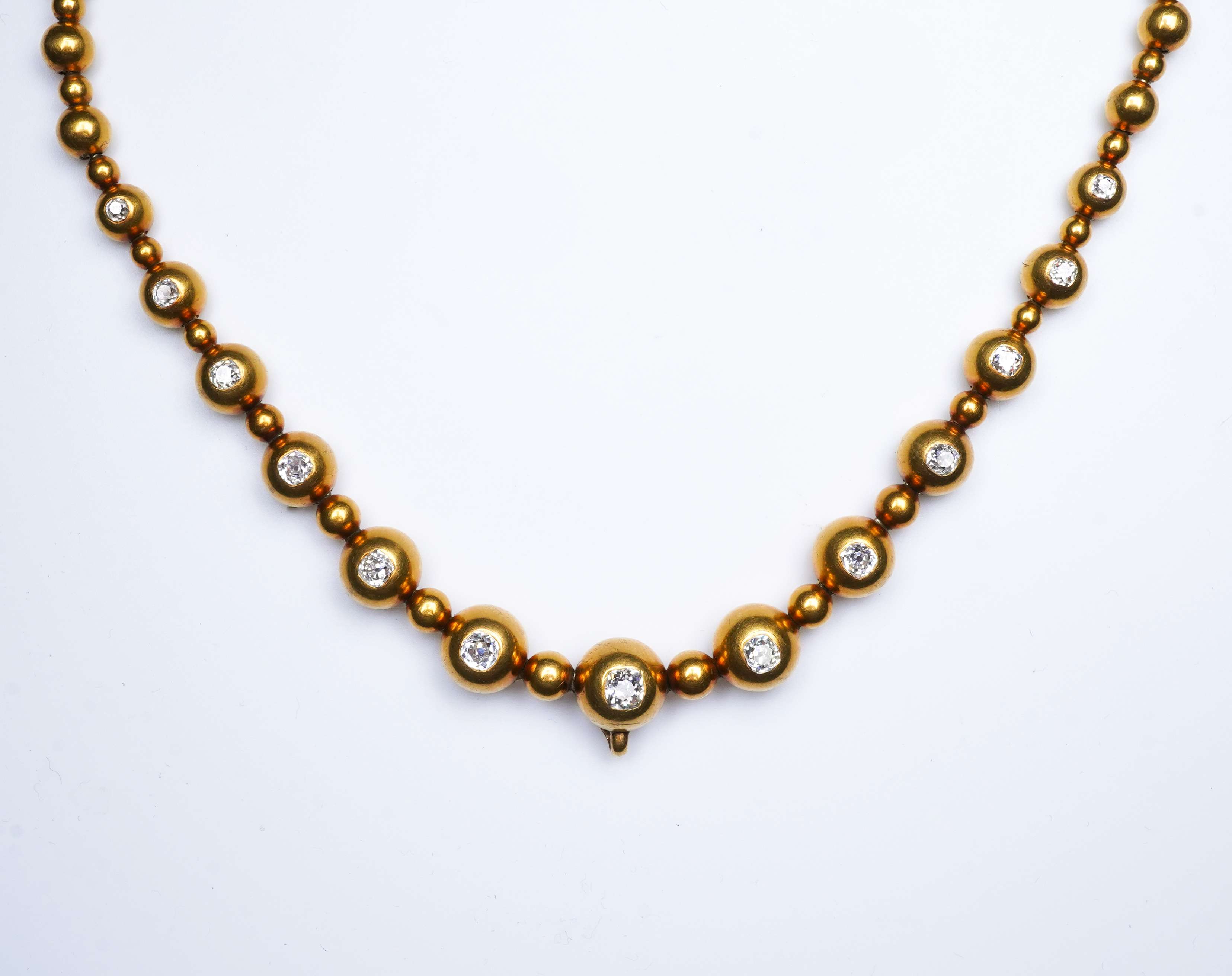 An unusual Victorian gold and diamond necklace, late 19th century